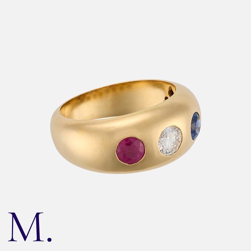 136 - A Vintage Ruby, Sapphire and Diamond Three Stone Gypsy Ring in 18 carat gold, set with a round cut d... 