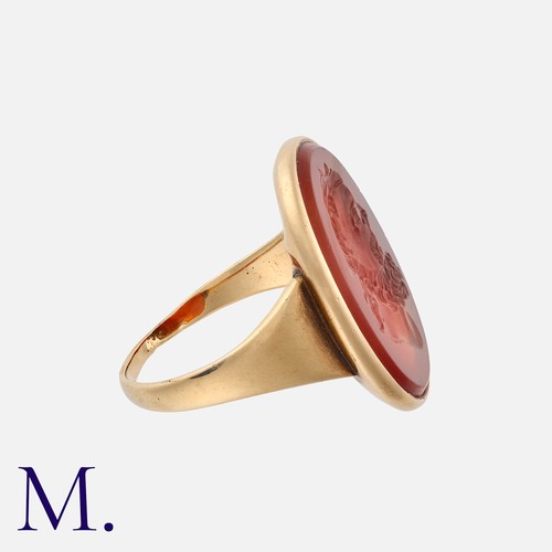 169 - A Carved Carnelian Intaglio Ring in yellow gold, set with a carved carnelian intaglio depicting the ... 