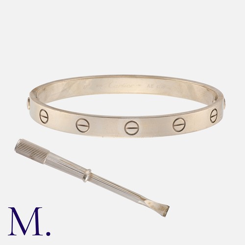152 - CARTIER. A Love Bangle Bracelet in 18K white gold with attendant screwdriver.  Signed Cartier and se... 
