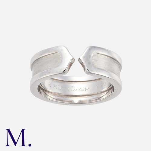 133 - CARTIER. A 'C de Cartier' Ring in 18K white gold.  Signed Cartier and marked for 18ct gold.  With Ca... 