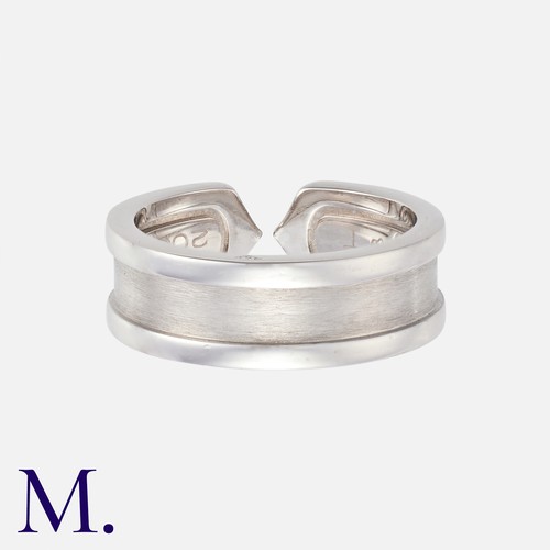 133 - CARTIER. A 'C de Cartier' Ring in 18K white gold.  Signed Cartier and marked for 18ct gold.  With Ca... 