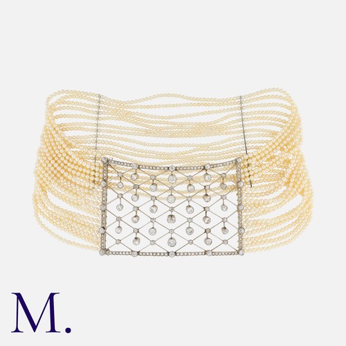 80 - A Natural Pearl and Diamond Choker with seventeen rows of natural pearls (approx. 1,940 pearls) with... 