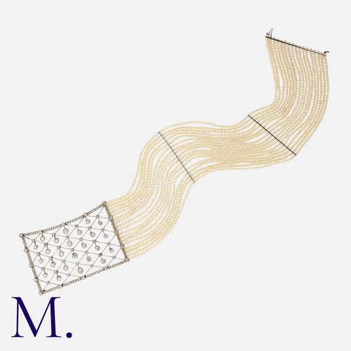 80 - A Natural Pearl and Diamond Choker with seventeen rows of natural pearls (approx. 1,940 pearls) with... 