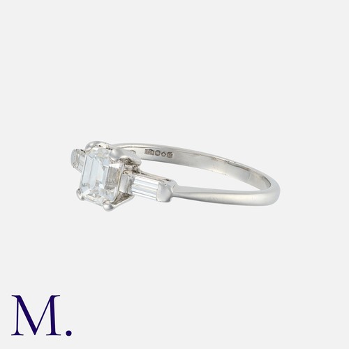 110 - A 1.02 Carat E Colour Diamond Ring in platinum, set with a principal emerald cut diamond of 1.02 car... 