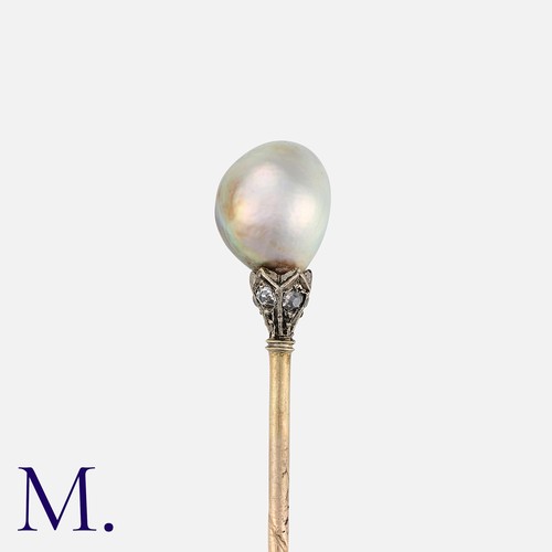 106 - An Antique Pearl and Diamond Stick Pin set with a grey pearl of 6.75mm diameter (untested) with a di... 