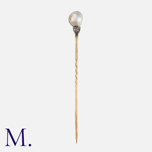 106 - An Antique Pearl and Diamond Stick Pin set with a grey pearl of 6.75mm diameter (untested) with a di... 