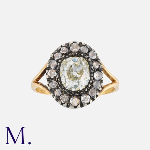 62 - An Old Cut Diamond Cluster Ring, in yellow gold and silver, set with a principal old cut diamond of ... 