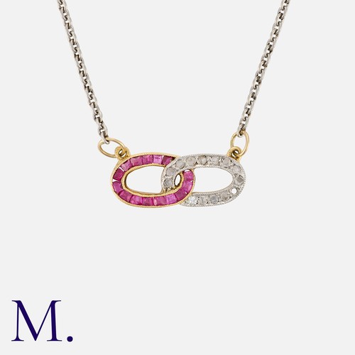 96 - An Art Deco Ruby and Diamond Necklace in yellow gold and platinum, comprising two interlocking oval ... 