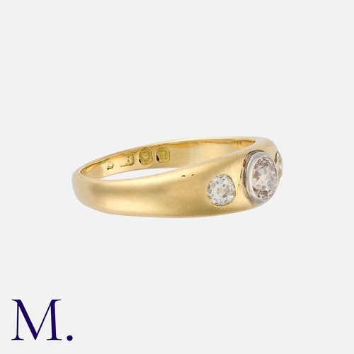 82 - An Old Cut Diamond Gypsy Three Stone Ring in 18 carat gold, set with three old cut diamonds totallin... 