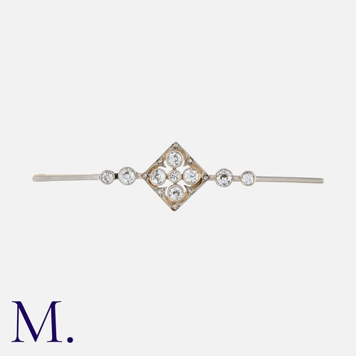 134 - An Antique Diamond Brooch in yellow and white gold, set with nine old cut diamonds weighing approx. ... 