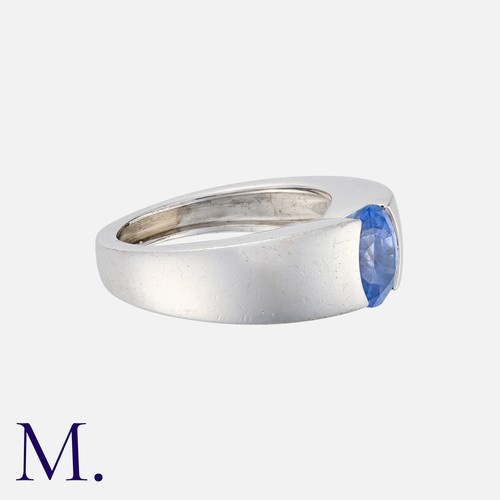 75 - BOUCHERON. A Sapphire Ring in 18K white gold, set with an oval sapphire.  Maker's mark for Boucheron... 