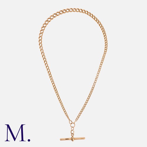 125 - An Antique Gold Curb Chain with T-Bar in 9K rose gold, with solid curb links.  Marked for 9ct gold.
... 
