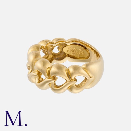 68 - VAN CLEEF & ARPELS. A Gold Heart Band in 18K yellow gold, with graduating stylised openwork hearts f... 