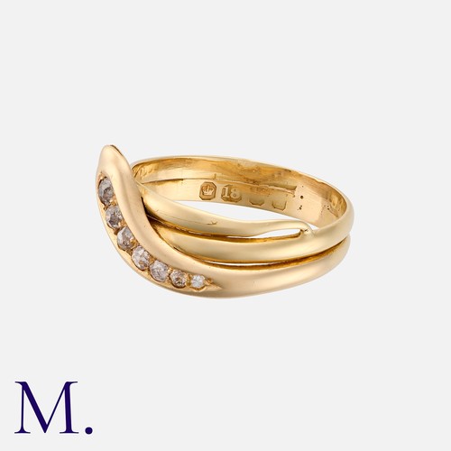 1 - An Old Cut Diamond Snake Ring in 18 carat yellow gold, designed as a coiled snake, the head set with... 