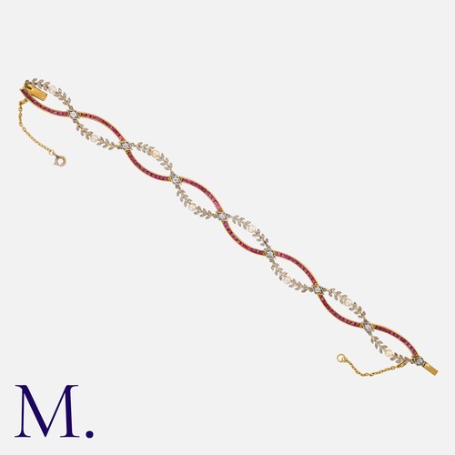 38 - A Fine Art Nouveau Ruby Pearl and Diamond Bracelet  in 18 carat yellow gold and platinum, comprising... 