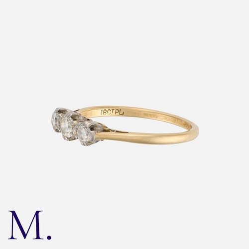 4 - A Diamond 3-Stone Ring in yellow gold and platinum, set with three round cut diamonds weighing appro... 
