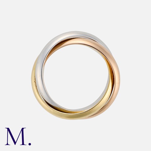 49 - CARTIER. A Trinity Ring in 18K yellow, rose and white gold, signed Cartier and serial numbered. Band... 