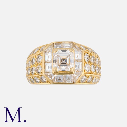 180 - BOUCHERON. A Diamond Ring in 18K yellow gold, set with an Asscher cut diamond to the centre weighing... 