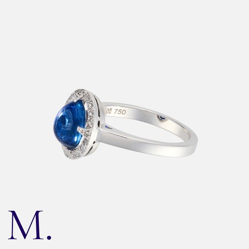 28 - A 2.90 Carat Unheated Ceylon Sapphire and Diamond Ring in 18 carat white gold. set with a principal ... 