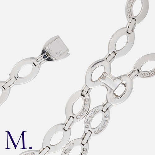 51 - CARTIER. A Diamond Diadea Necklace and Bracelet Set in 18K white gold, set with round cut diamonds, ... 