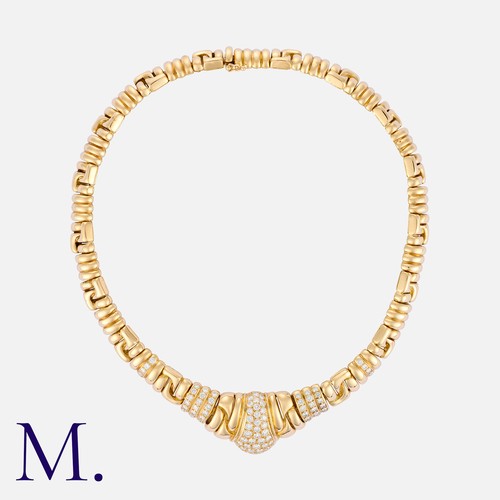 119 - BOUCHERON. A Diamond Collar in 18K yellow gold, set with round brilliant cut diamonds weighing appro... 