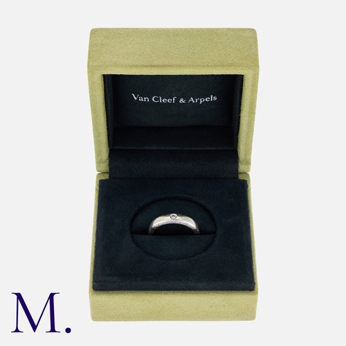 132 - VAN CLEEF & ARPELS. A Diamond Band in platinum, set with a round brilliant cut diamond accent to a p... 