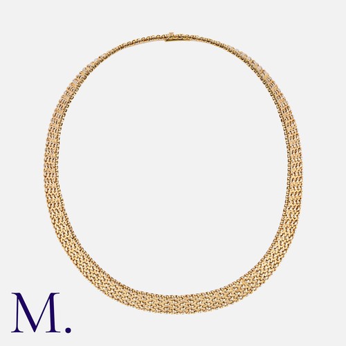 122 - A French Woven Gold Collar in 18K yellow and white gold.  French marks for 18ct gold and maker's mar... 