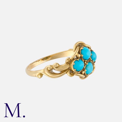 26 - An Antique Turquoise Ring in yellow gold, set with four cabochon turquoise in a quatrefoil motif to ... 