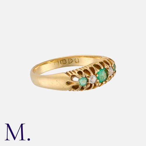 25 - An Antique Emerald and Diamond Ring in 18K yellow gold, set with three emeralds and two old cut diam... 