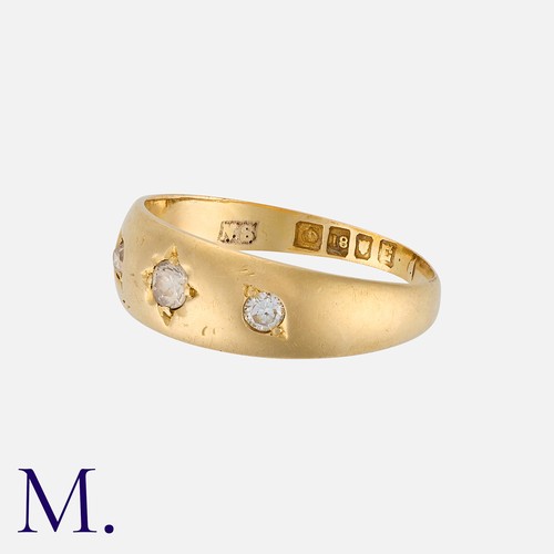 82 - An Antique Diamond Gypsy Ring in 18K yellow gold, set with three diamonds across the face of the rin... 