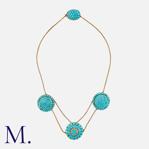 157 - An Antique Turquoise Necklace in yellow gold, the central cabochon turquoise and rose cut diamond se... 