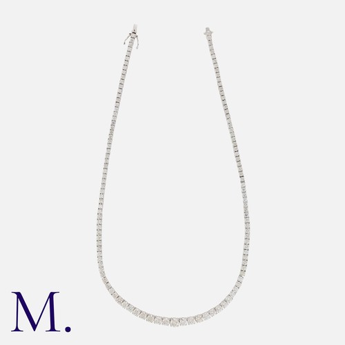 110 - A 17.25ct Diamond Line Necklace in white gold, set with 125 round brilliant cut diamonds weighing a ... 