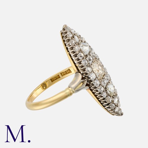 166 - An Antique Diamond Navette Ring in yellow gold and silver, the navette shaped body set with a princi... 