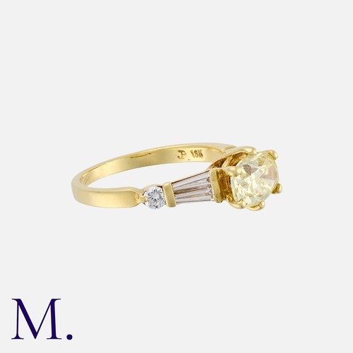 152 - A 1.00 Carat Fancy Yellow Diamond Ring in 18 carat yellow gold, set with a principal oval cut fancy ... 