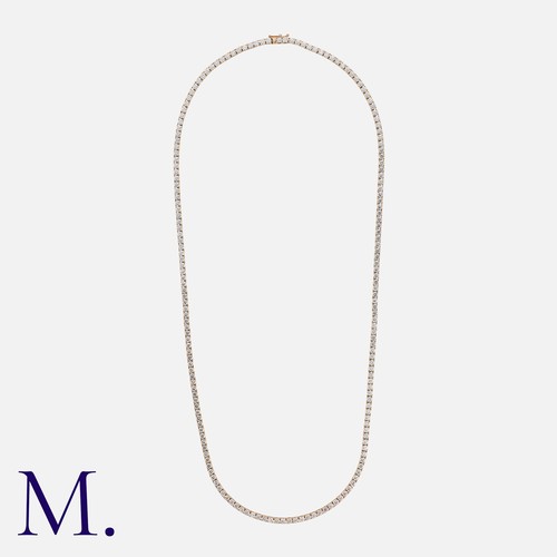 136 - An 18.50 Carat Diamond Line Necklace. in 18 carat rose gold, set with a row of interlocking links, e... 
