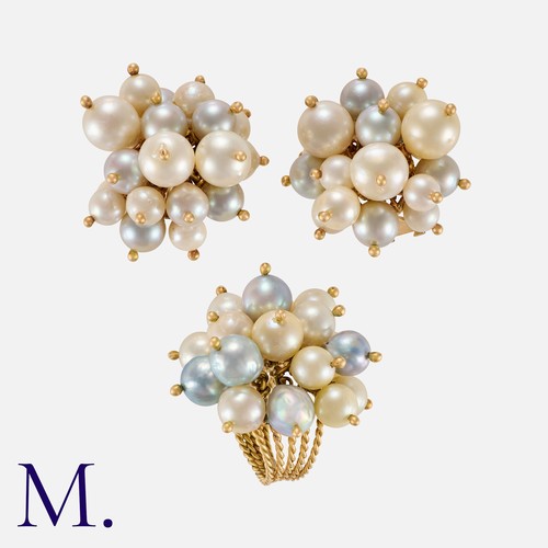156 - A Pearl Ring and Earrings Suite in yellow gold. Comprising a ring of twisted wirework design set wit... 