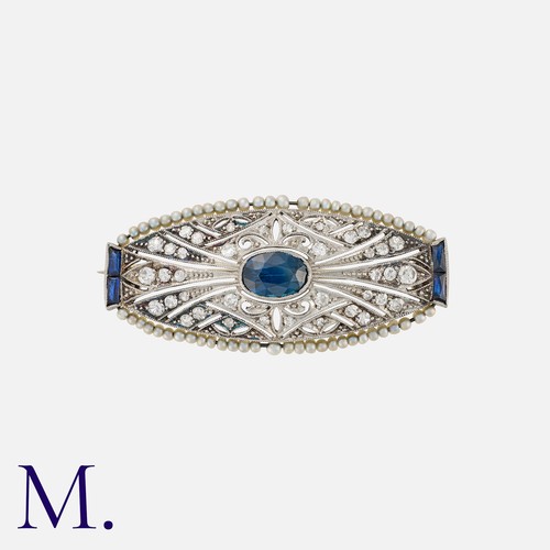 254 - A Sapphire Pearl and Diamond Brooch in yellow gold and platinum, of openwork design, set with a cent... 