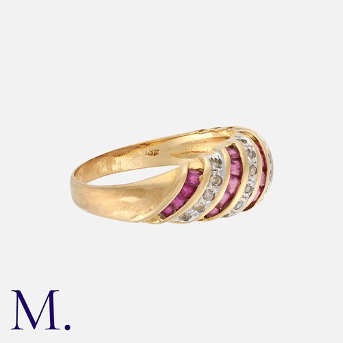 259 - A Ruby and Diamond Ring in yellow gold set with round cut diamonds weighing approx. 0.10ct and calib... 