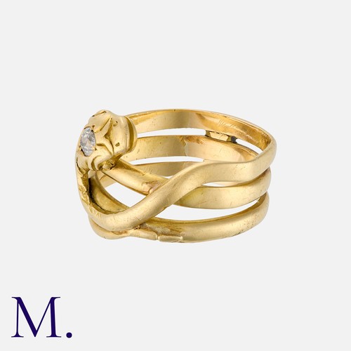 1 - An Antique Diamond Snake Ring in yellow gold set with an old cut diamond weighing approx. 0.20ct set... 
