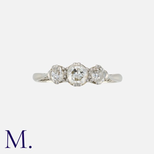 88 - A Diamond Three Stone Ring in 18 carat gold and platinum, set with three round cut diamonds totallin... 