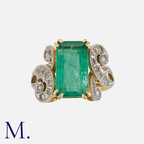 63 - An Emerald and Diamond Ring in yellow gold, set with an emerald-cut emerald weighing approx. 4.0ct w... 