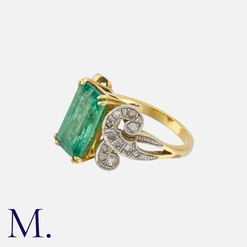 63 - An Emerald and Diamond Ring in yellow gold, set with an emerald-cut emerald weighing approx. 4.0ct w... 