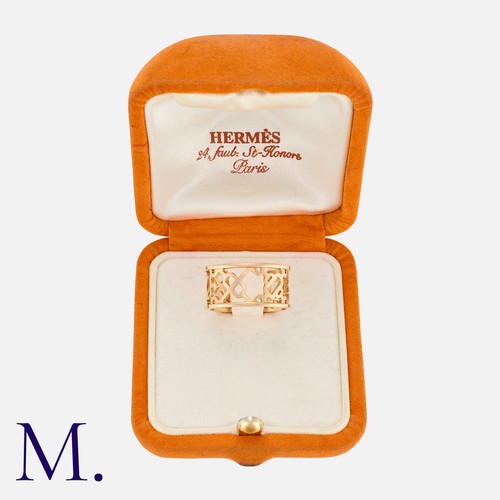 103 - HERMÈS, A 'Chain D'ancre Passarelle' Ring in 18 carat rose gold, designed as a stylised openwork cha... 