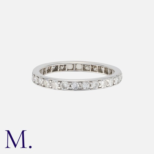 72 - A Diamond Eternity Ring in platinum, set with round cut diamonds weighing approx. 0.56ct.  Unmarked,... 