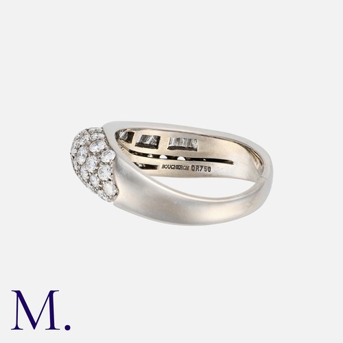 70 - BOUCHERON. A Diamond Band in 18K white gold, set with round-cut and baguette-cut diamonds weighing a... 