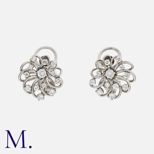 73 - A Pair of Retro Diamond Earrings in 18K white gold, set with round cut diamonds weighing approx. 1.0... 