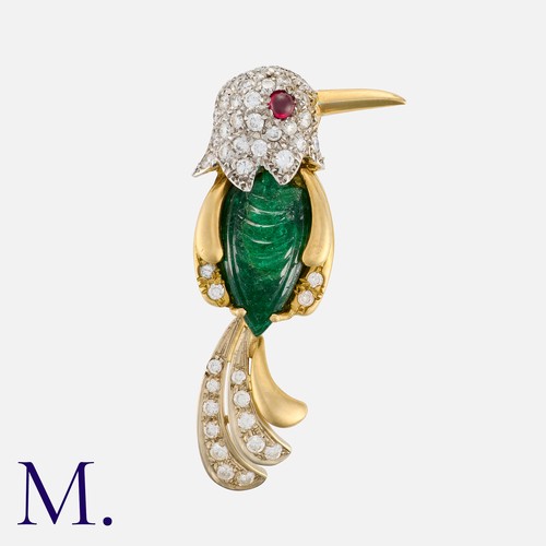101 - VAN CLEEF & ARPELS, An Emerald, Ruby and Diamond Bird Brooch in yellow gold, the body set with a car... 