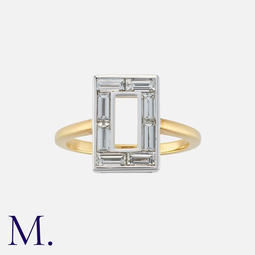 95 - A Diamond Ring in yellow and white gold, the rectangular face set with baguette cut diamonds totalli... 