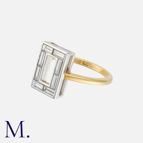 95 - A Diamond Ring in yellow and white gold, the rectangular face set with baguette cut diamonds totalli... 