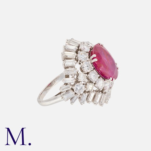 84 - CHAUMET. A Fine Burma Ruby and Diamond Ring in platinum set with an oval-cut ruby of approx. 4.17ct ... 